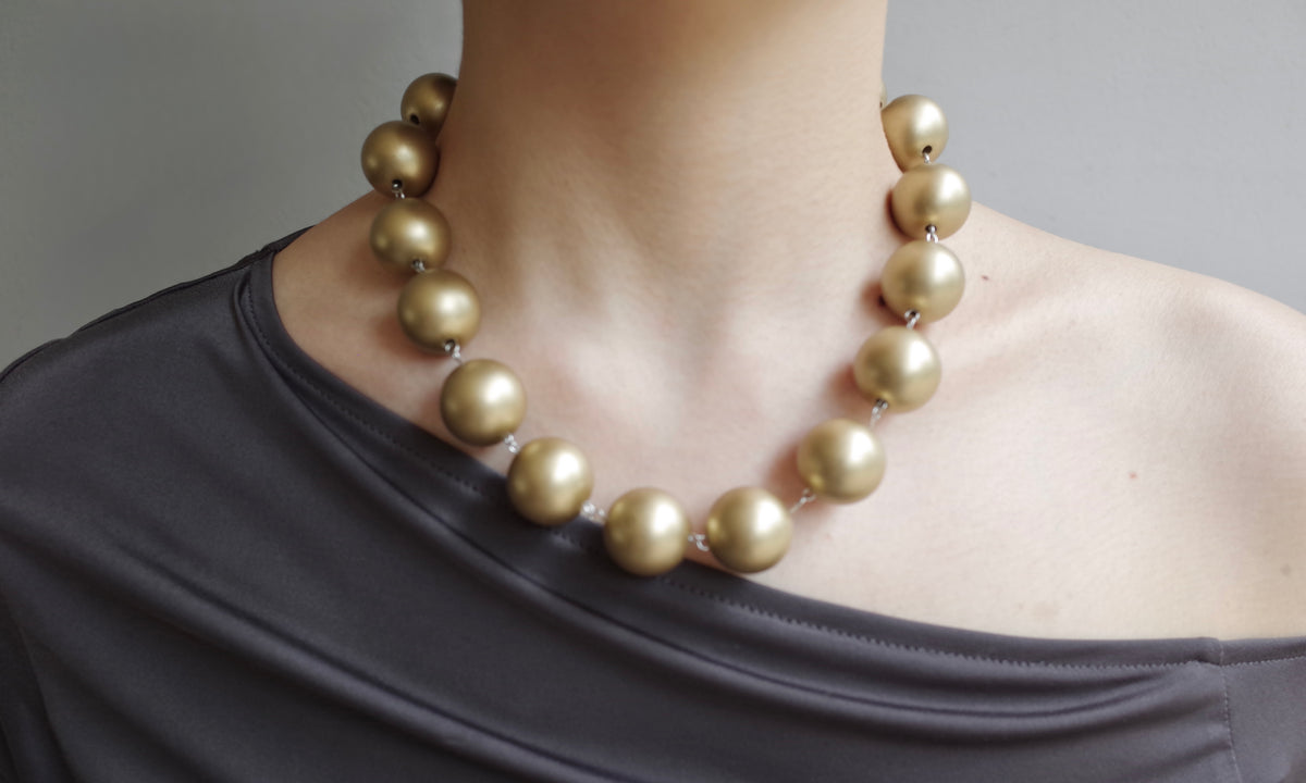 sacred.t kissed by champagne necklace
